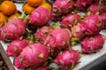 Dragon fruit on market, pile of dragonfruits