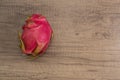 Dragon fruit on old wood background