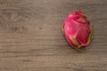 Dragon fruit on old wood background