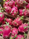 Dragon fruit pitaya pitahaya in wicker baskets in a supermarket