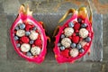 Dragon fruit salads with berries over slate