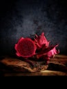 Dragon fruit on wooden logs Royalty Free Stock Photo
