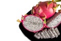 Dragon fruits healthy food in black dish on white