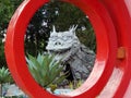 A dragon head temple in the center of red circle with background green forest Royalty Free Stock Photo