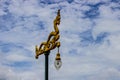 Dragon lamp with sky as background. Royalty Free Stock Photo