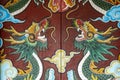 A dragon painting at the gate of an ancient temple in Hoi An old town, Vietnam. The dragon pattern of ancient Chinese art , Dragon Royalty Free Stock Photo