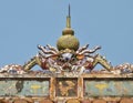 Dragons head on top of a temple in Vietnam