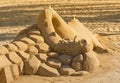 Dragon sand sculpture on the beach Royalty Free Stock Photo