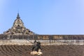 Dragon sculpture in chains on a chinese buddhist temple roof Royalty Free Stock Photo