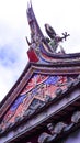 the dragon sculture on the temple roof