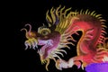 Dragon statue on the black background Royalty Free Stock Photo