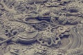 Dragon statue on chinese taoism temple wall