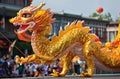 Dragon Statue on Display in Front of Crowd