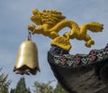 Dragon statue holding a bell in Nanshan tourist attraction, Bronze Buddha Statue