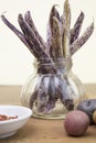 Dragon Tongue Beans bunched in a jar with small mini potatoes an Royalty Free Stock Photo