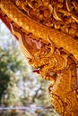 Dragon wood carving on a wall of a Buddhist temple
