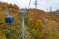 Dragondola (Naeba-Tashiro Gondola) in autumn foliage season. The longest aerial gondola lift line Japan.