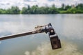 Dragonfly sits on tripod action camera in nature. Shooting nature action camera. Interesting insects