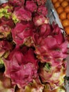 Dragonfruits at the market very red fresh