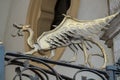 Dragons on the entrance gate of Palazzo civico, Cagliari, Sardinia, Italy