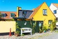 Dragor. Denmark. July 24, 2019 Beautiful, small, yellow rustic houses. Traditional Scandinavian style. Fishing village Royalty Free Stock Photo