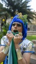 Dragqueen in her green and yellow outfit and makeup Royalty Free Stock Photo