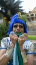 Dragqueen in her green and yellow outfit and makeup Royalty Free Stock Photo