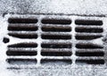 Drain grate covered with snow Royalty Free Stock Photo