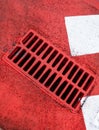 Drain grate on the road Royalty Free Stock Photo