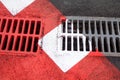 Drain grates on the road Royalty Free Stock Photo