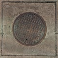Drain manhole cover Royalty Free Stock Photo