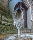 Drain pipe with frozen water Royalty Free Stock Photo