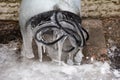 Drain pipe with frozen water and wires Royalty Free Stock Photo