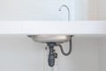 Drain pipe and kitchen sink. Royalty Free Stock Photo