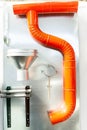 Drain water from the roof of the house. Elements of a stormwater system. A sample of goods in the storefront. Trade in Royalty Free Stock Photo