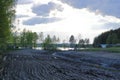 Drainage ditch in the peat extraction site. Drainage and destruction of peat bogs in finland