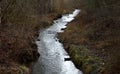 Drainage drainage reclamation channel is an outdated way to lower groundwater levels. dikes of gray stones. supplies water to irri Royalty Free Stock Photo