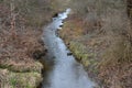 Drainage drainage reclamation channel is an outdated way to lower groundwater levels. dikes of gray stones. supplies water to irri Royalty Free Stock Photo