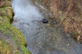 Drainage drainage reclamation channel is an outdated way to lower groundwater levels. dikes of gray stones. supplies water to irri Royalty Free Stock Photo