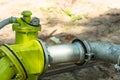 drainage system for pumping out groundwater out of the ground. Water pumping station. A large yellow water pipe with a pressure Royalty Free Stock Photo