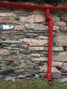 Drainpipe on rustic building