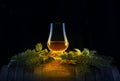 Dram of Whisky in Nosing Glass atop Whisky Cask