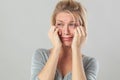 Drama for blond woman crying with big tears expressing disappointment Royalty Free Stock Photo