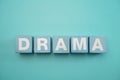 Drama word alphabet letters on blue background