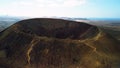 Dramatic aerial reveal clip of the volcano crater of volcan Calderon Hondo