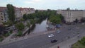 Dramatic aerial top view flight drone. City Berlin Neukoeln canal bridge river