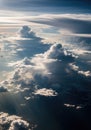 Dramatic aerial view of cumulus clouds with sunlight streaming through Royalty Free Stock Photo