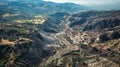 A dramatic aerial view of the mountainous terrain reveals the devastating aftermath of a series of mudslides with deep Royalty Free Stock Photo