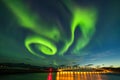 Dramatic aurora borealis, polar lights, over mountains in the North of Europe - Lofoten islands, Norway Royalty Free Stock Photo