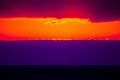 Dramatic sunset with clouds over the ocean Royalty Free Stock Photo